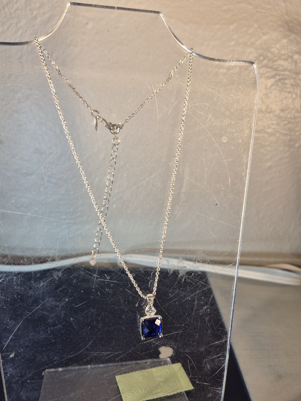 Elegant Silver Necklace with Deep Blue Pendant The Bracelet is 925,